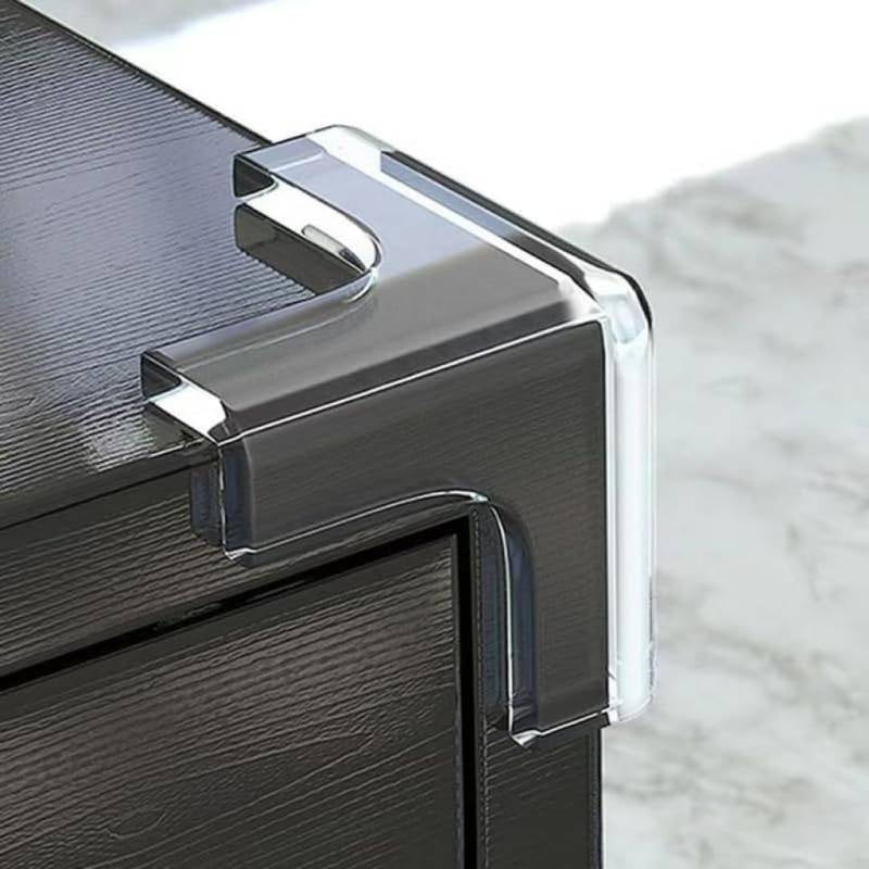 Clear plastic corner protector on a black surface