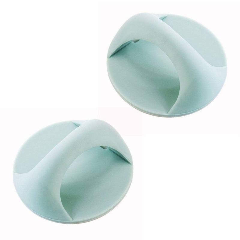 Two light blue silicone teething rings on a white background