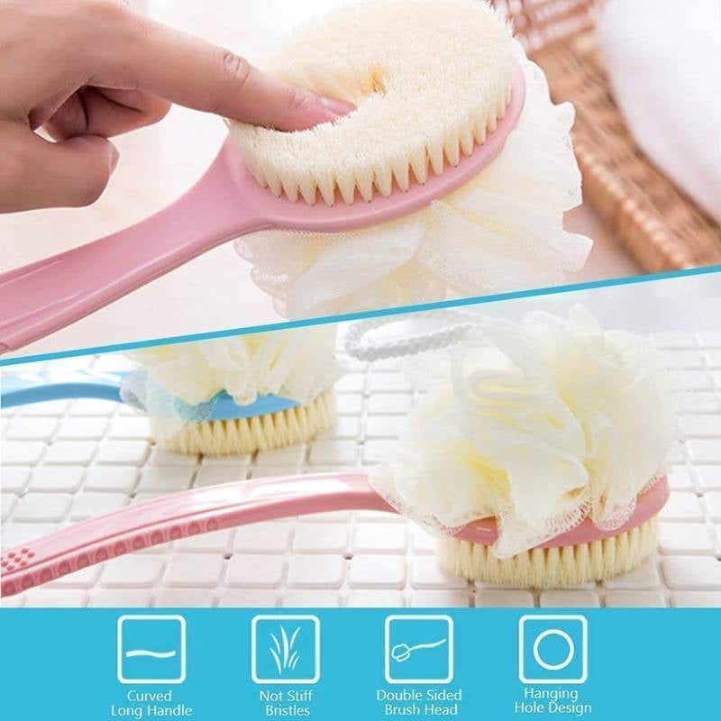 Pink scrub brush with a double-sided head being held above a white surface.