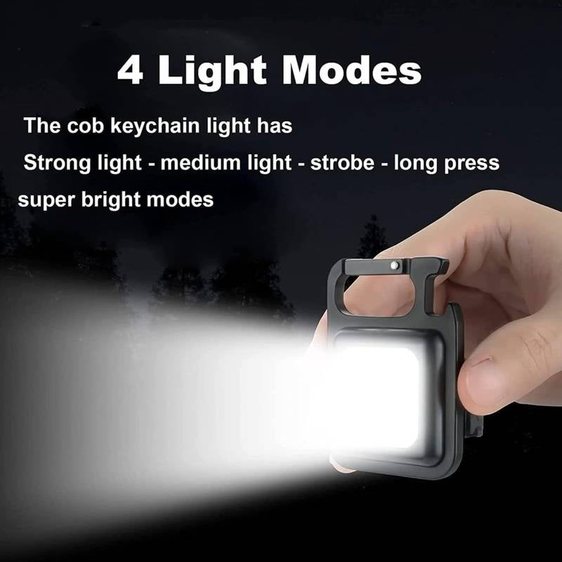 Hand holding a keychain light with text describing its features on a dark background