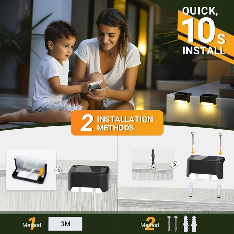 Woman and child with installation guide for outdoor lights