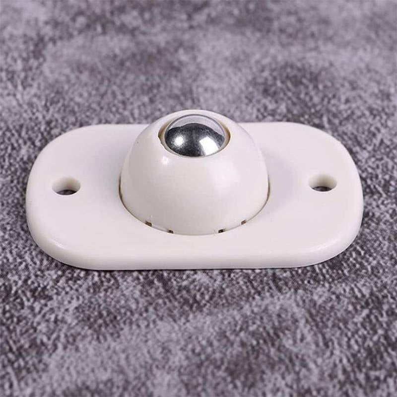White electronic device with a spherical component on a textured gray surface