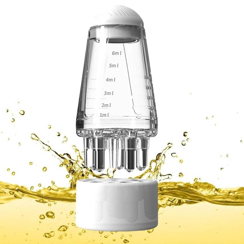 Transparent measuring device with liquid splashes on a white background