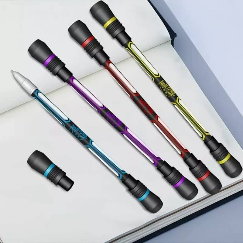 Set of colorful pens on an open book