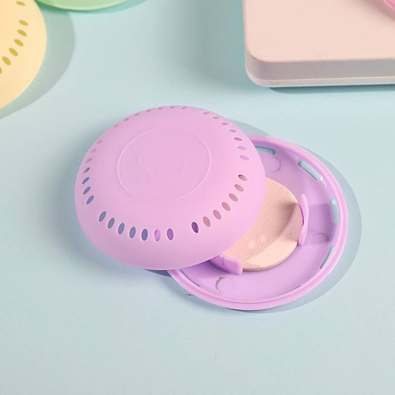Pink silicone lid on a light blue background