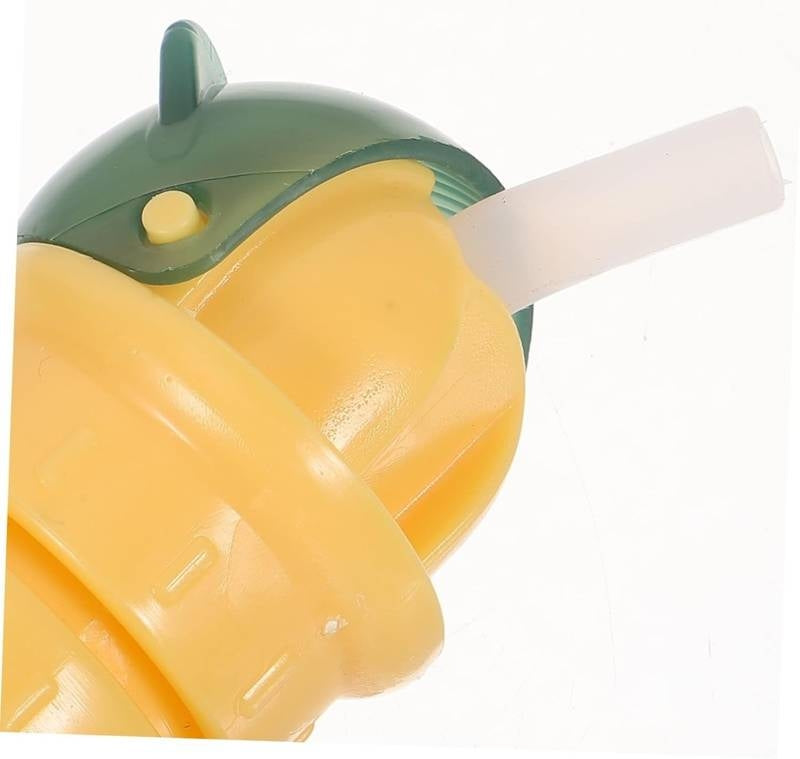 Yellow and green sippy cup with a straw on a white background