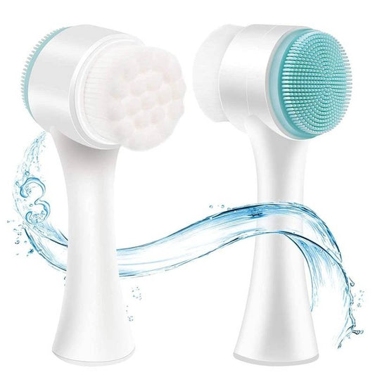 A white 2-in-1 facial cleansing brush showing the soft white bristle side and the blue silicone exfoliating side against a water splash background.