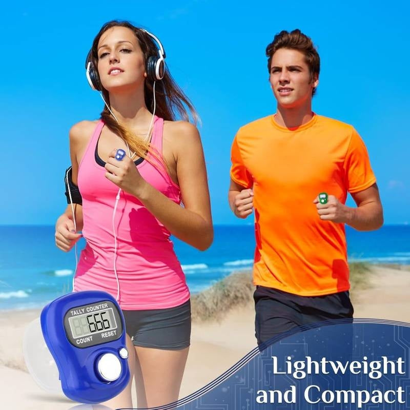 Two people running on a beach with a digital pedometer displayed.