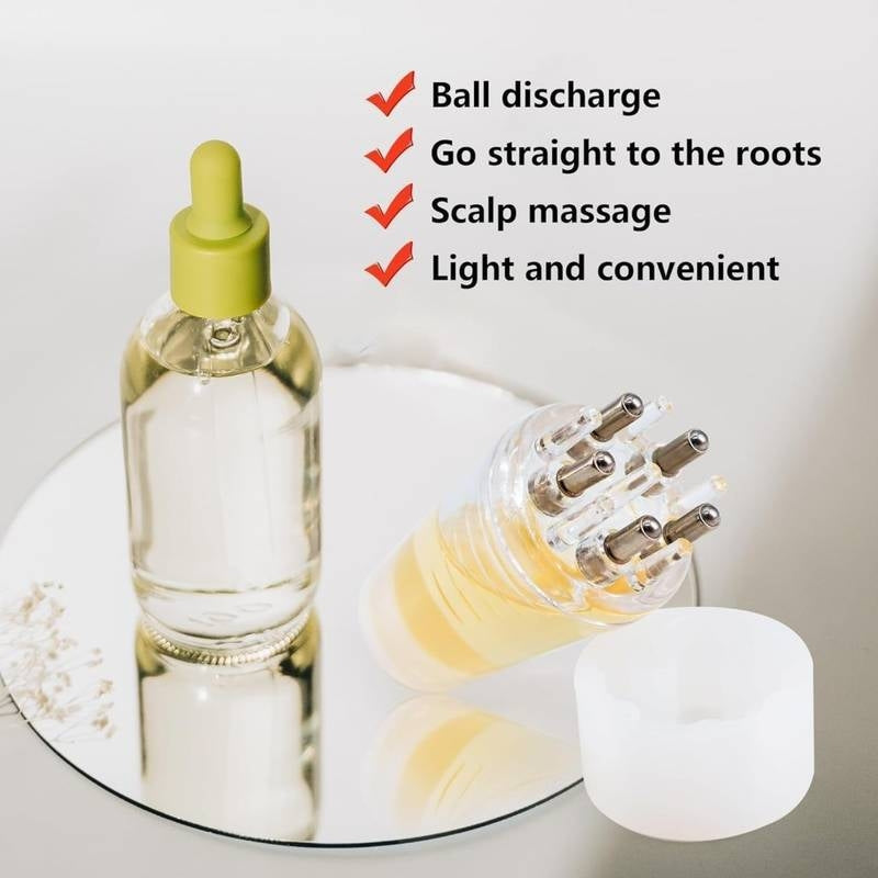 Bottle with a green cap and clear liquid, showing scalp massage tool on a white background.