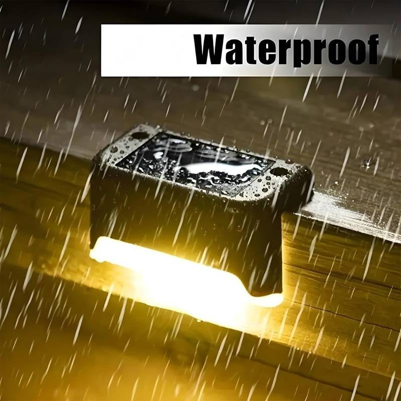 Light fixture on a wooden surface with raindrops and 'Waterproof' text above.