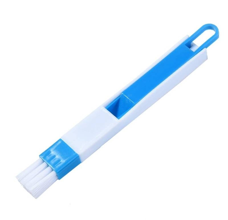 Blue and white cleaning brush with handle on a white background