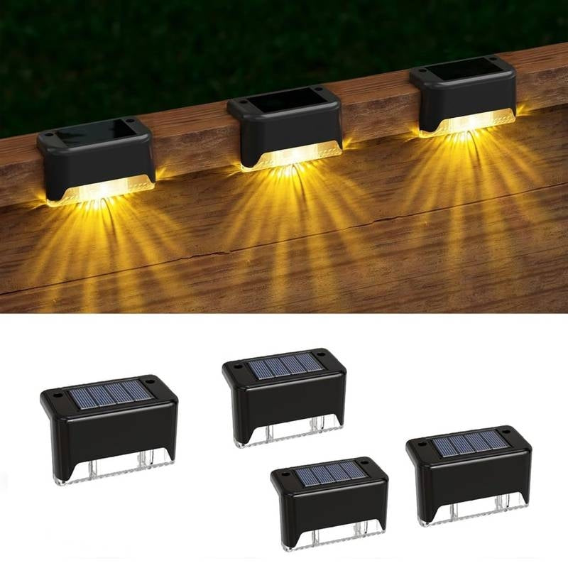 Solar-powered deck lights on a wooden surface with additional lights displayed below.