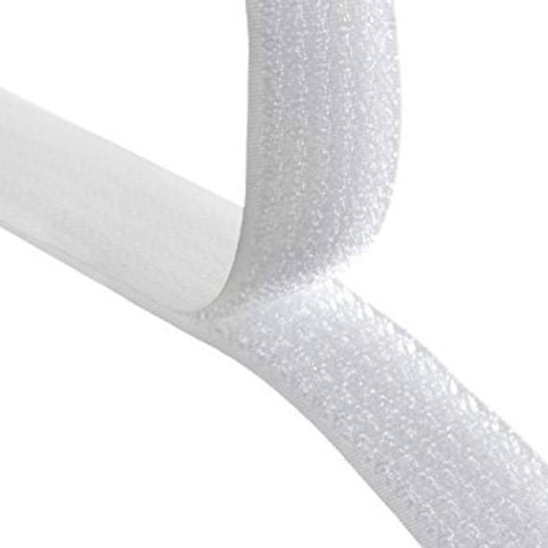 Close-up of a white textured hose on a white background