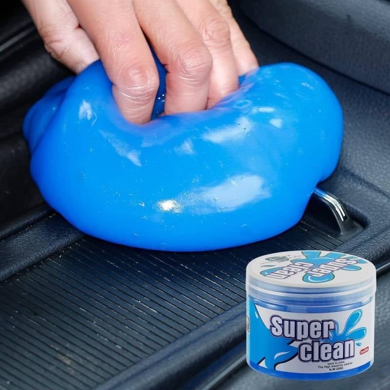 Blue gel being applied to a car seat with 'Super Clean' container in the foreground